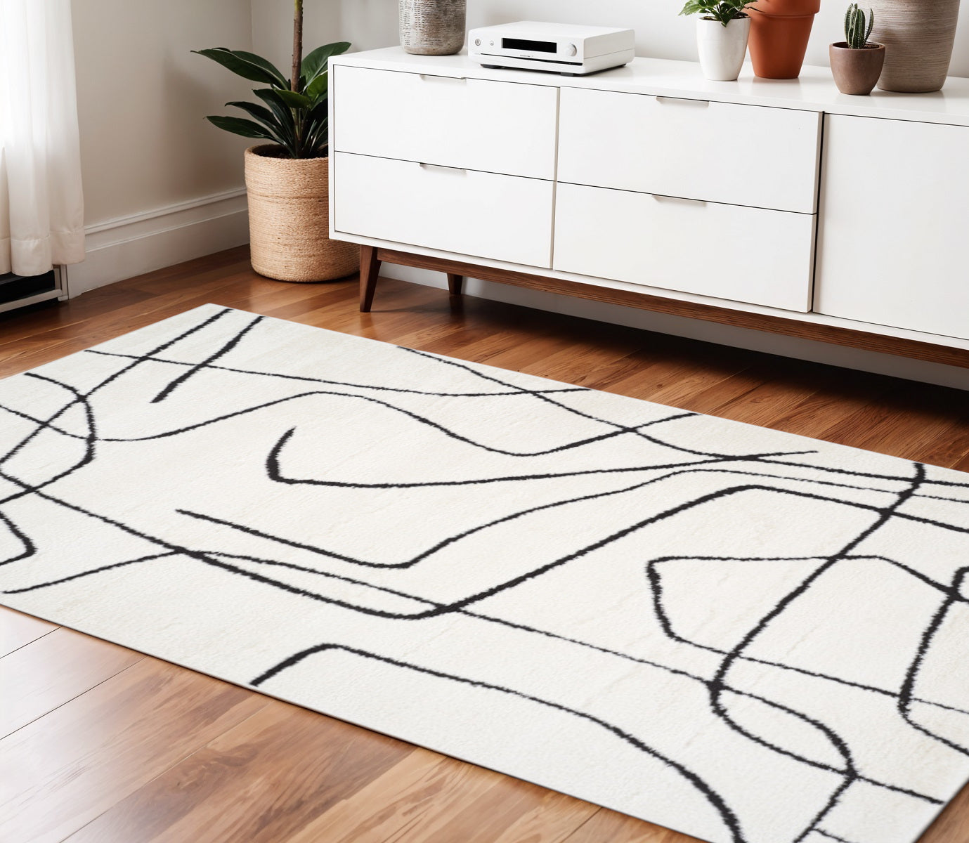 4 X 6 Ivory And Black Abstract Area Rug