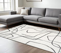 8 X 10 Ivory And Black Abstract Area Rug