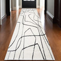 3 X 10 Ivory And Black Abstract Runner Rug