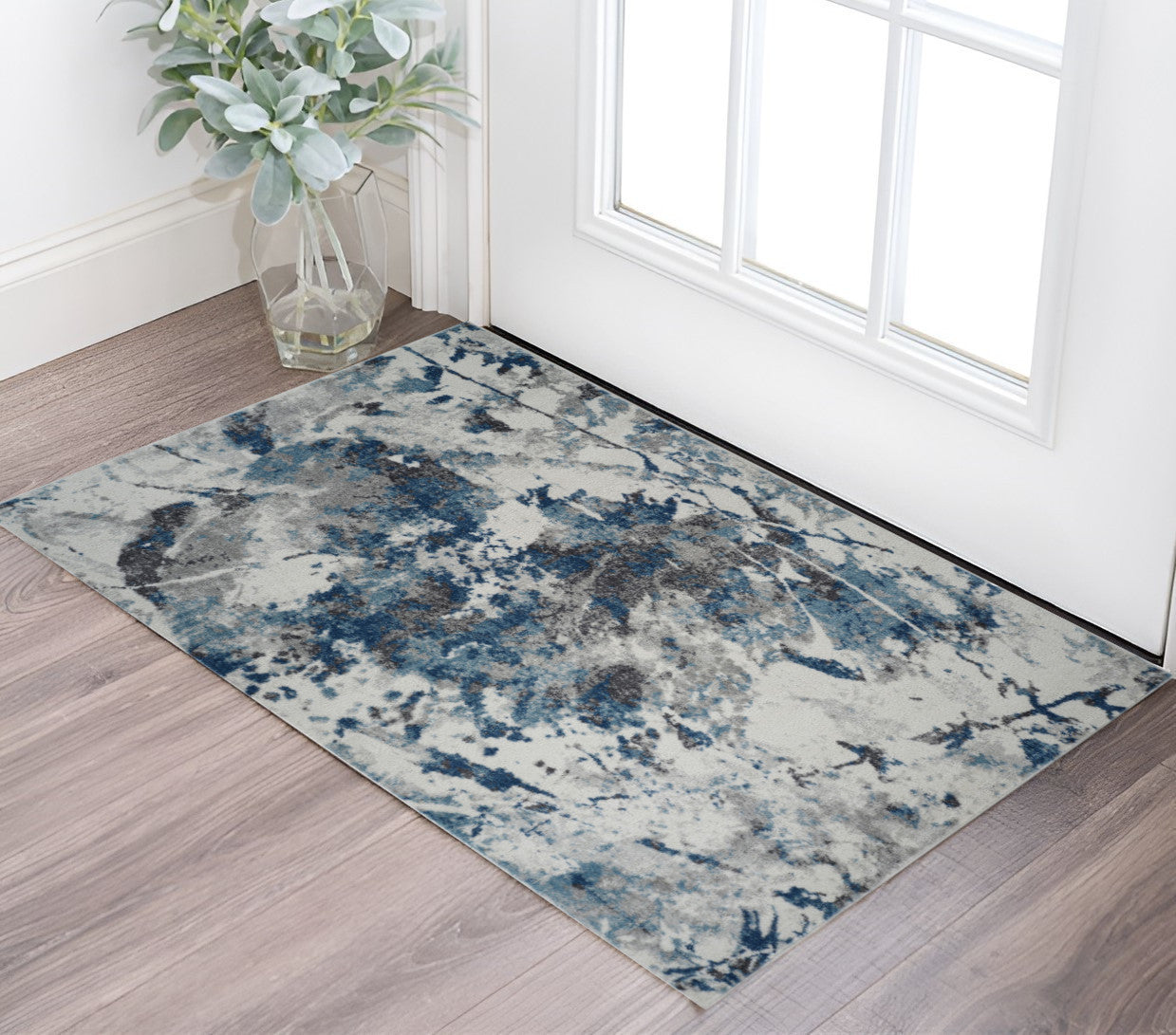 2 X 3 Ivory Teal And Black Abstract Area Rug