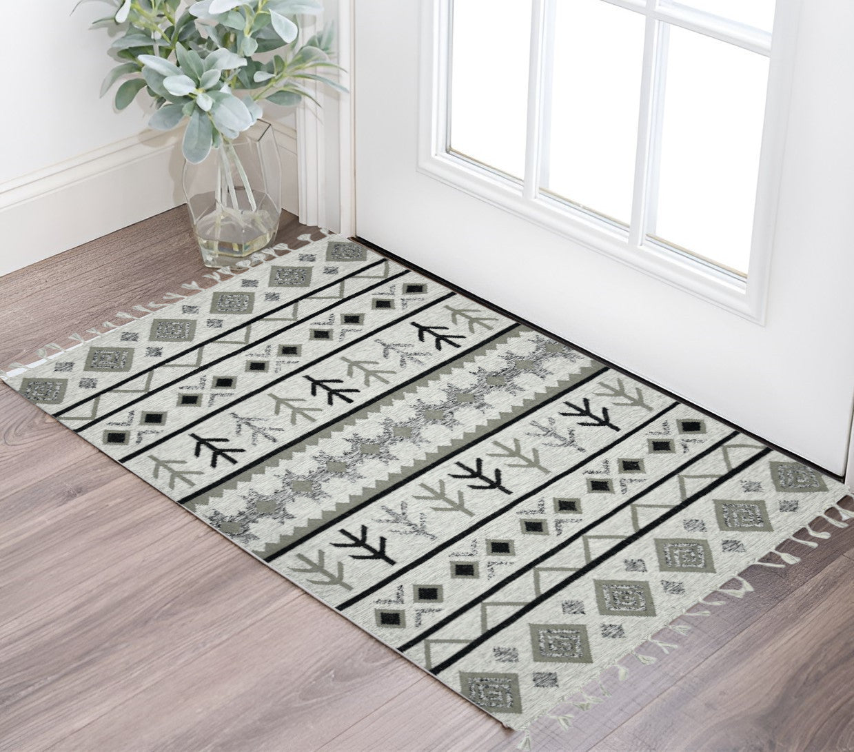 2 X 3 Black Gray And Ivory Wool Abstract Geometric Handmade Area Rug With Fringe