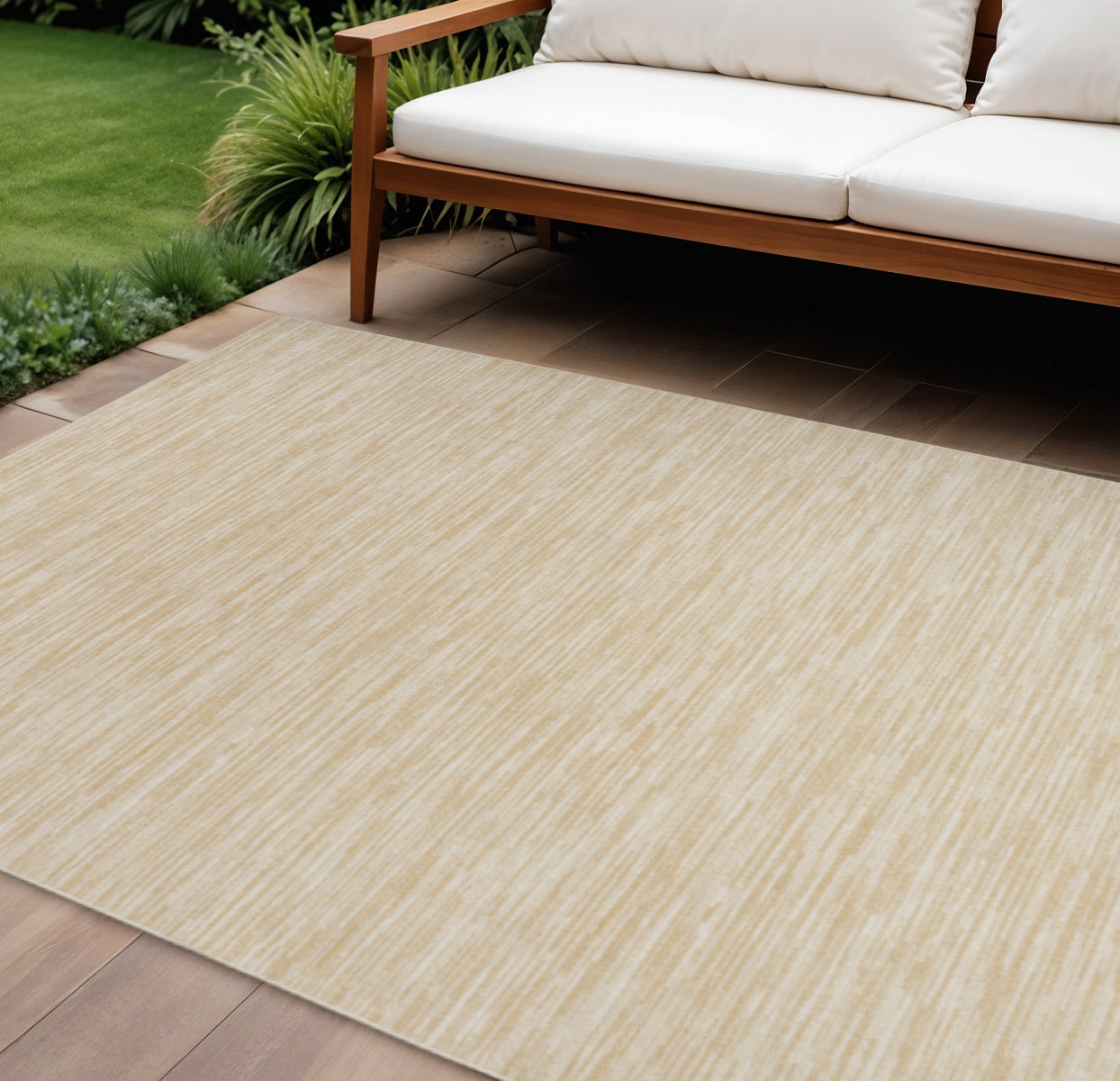 7 X 10 Ivory And Gold Abstract Indoor Outdoor Area Rug