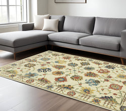 10' X 13' Ivory Yellow And Orange Oriental Area Rug With Fringe