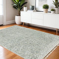4' X 5' Light Blue And Ivory Abstract Shag Area Rug With Fringe