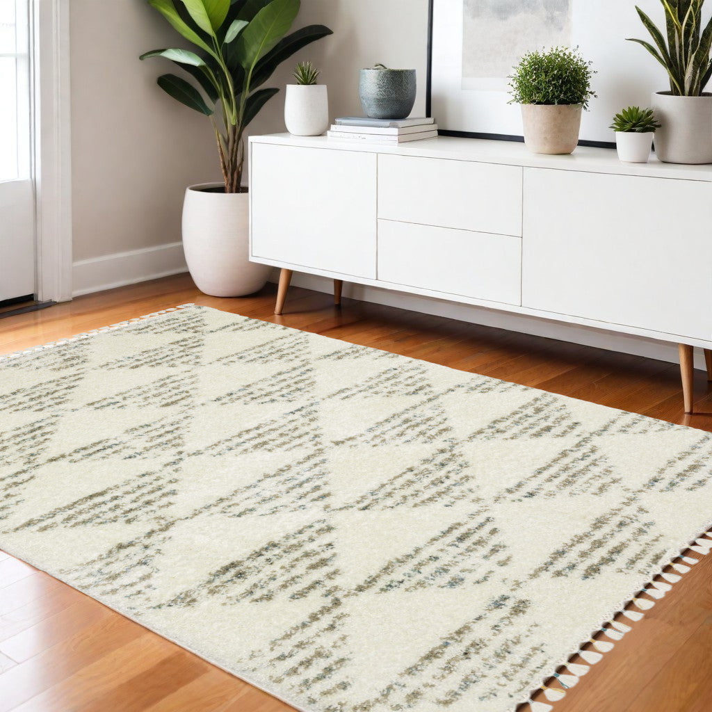 4' X 5' Ivory And Green Geometric Shag Area Rug With Fringe