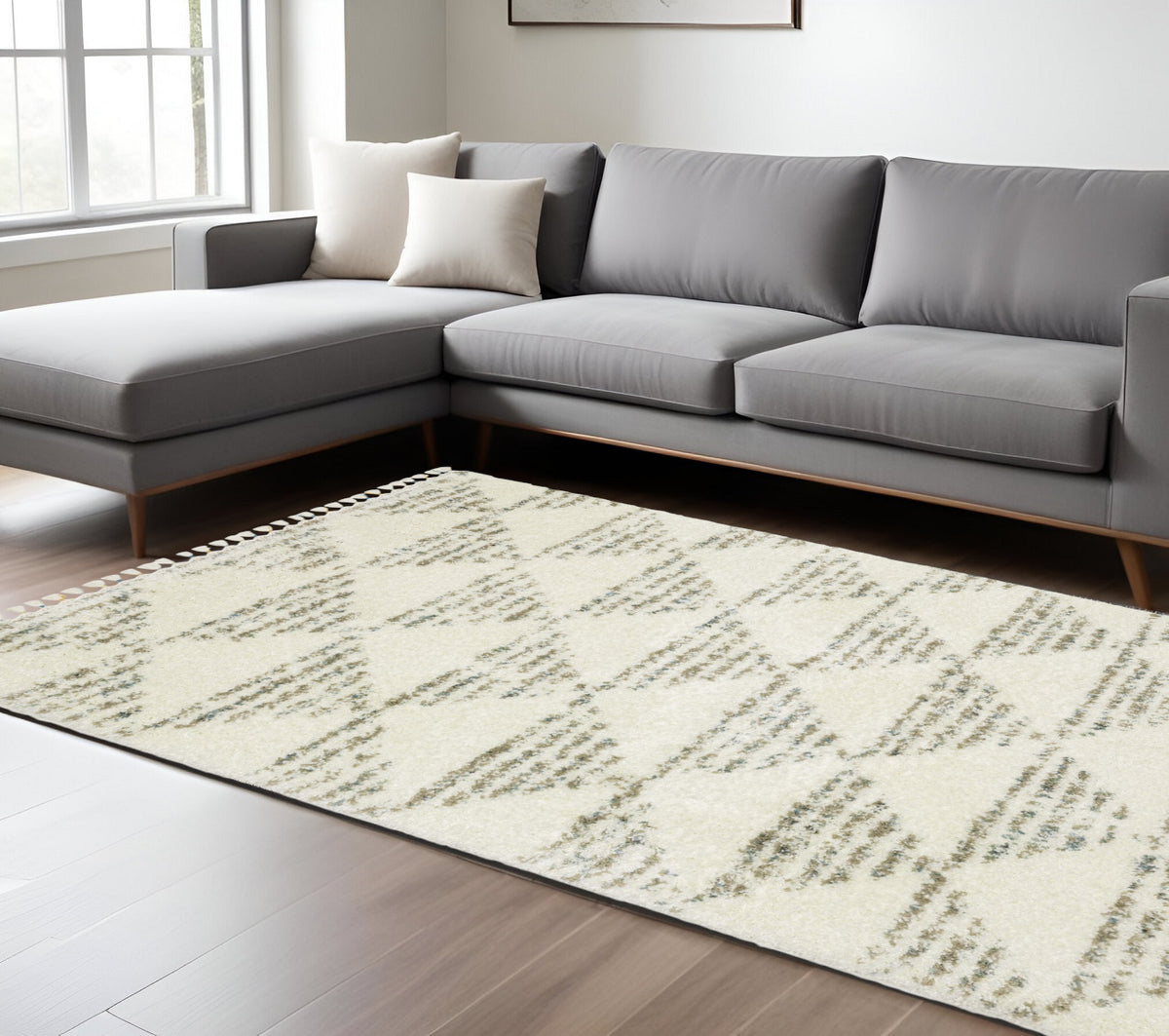 8' X 11' Ivory And Green Geometric Shag Area Rug With Fringe