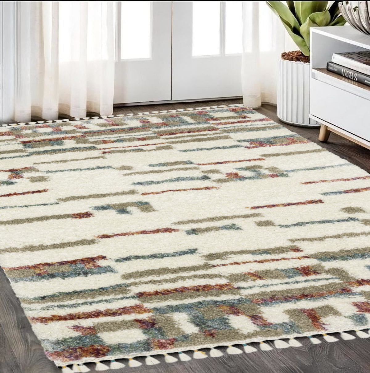5' X 8' Tan Gray And Ivory Abstract Shag Distressed Area Rug With Fringe