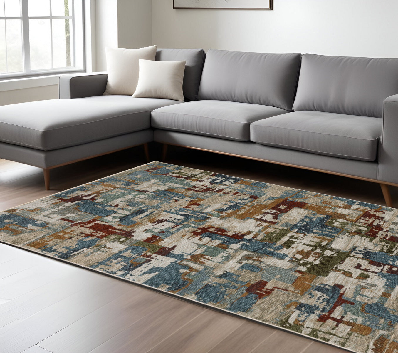 10' X 13' Beige Rust And Teal Abstract Distressed Area Rug With Fringe