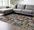 8' X 11' Beige Rust And Teal Abstract Distressed Area Rug With Fringe