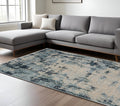 8' X 11' Beige And Blue Abstract Distressed Area Rug With Fringe
