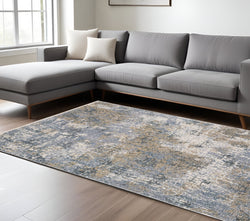 10' X 13' Beige And Blue Abstract Distressed Area Rug With Fringe