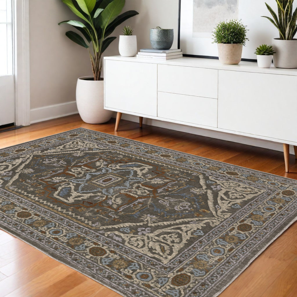 4' X 6' Blue Green And Ivory Medallion Area Rug