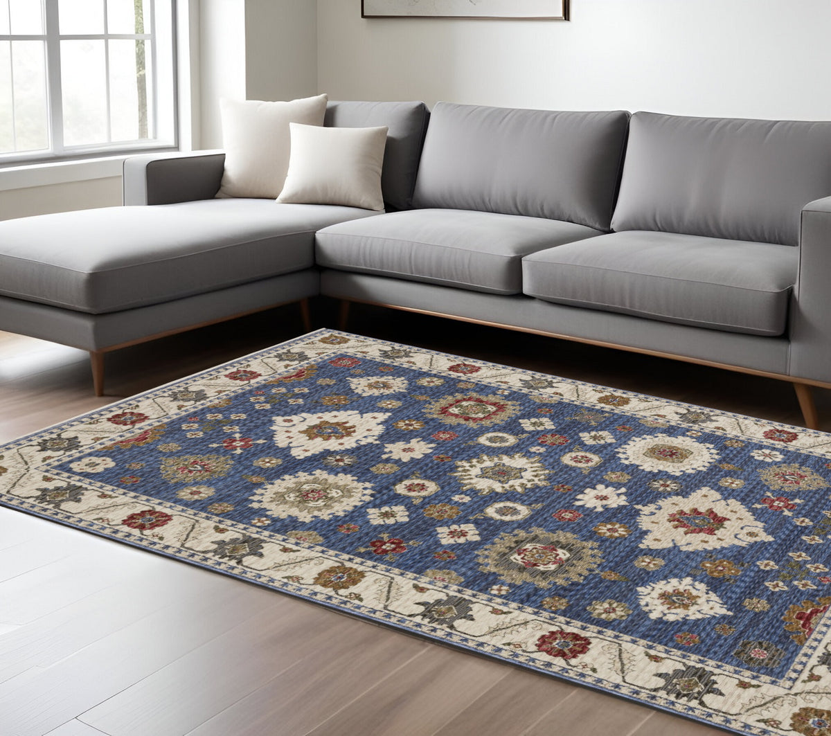 8' X 11' Blue And Ivory Floral Area Rug With Fringe