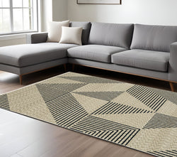 8' X 11' Beige Geometric Area Rug With Fringe