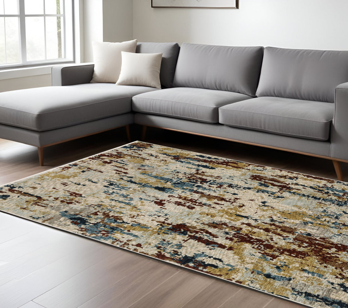 10' X 13' Beige Rust And Light Blue Abstract Distressed Area Rug With Fringe