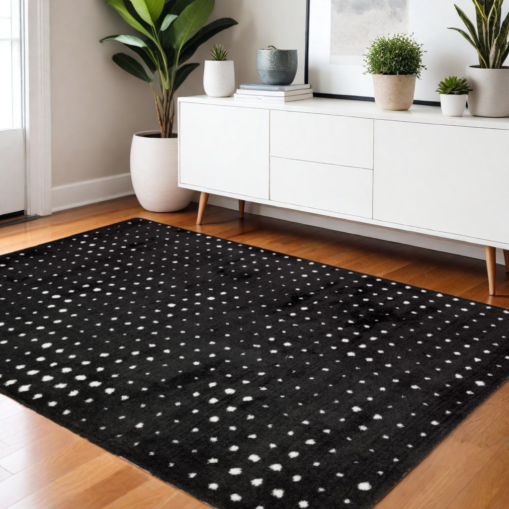 4' X 6' Black And Ivory Geometric Area Rug