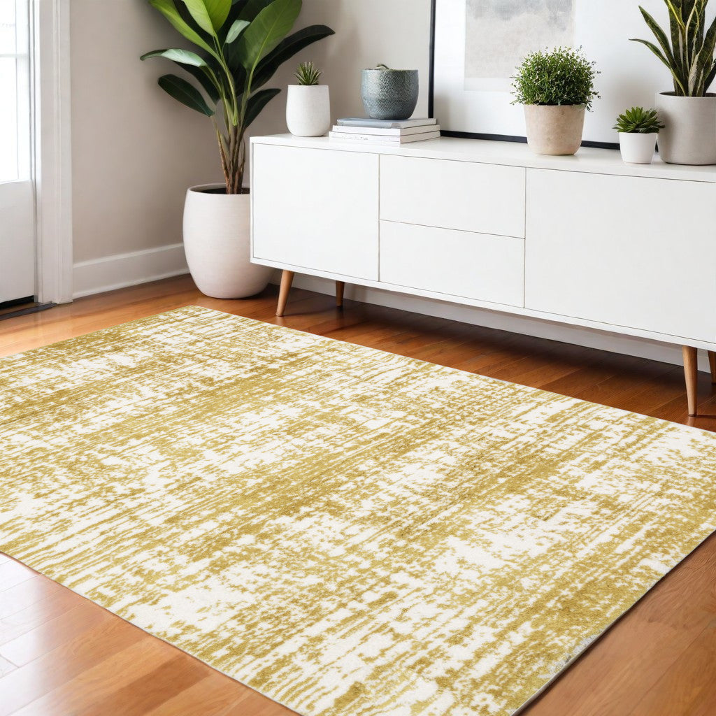 4' X 6' Gold And Ivory Abstract Area Rug