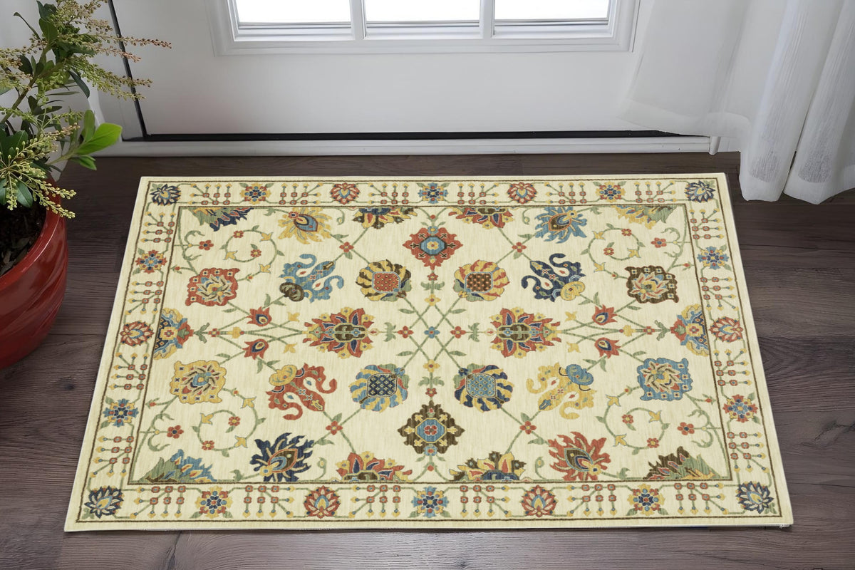 3' X 5' Ivory Yellow And Dark Orange Oriental Area Rug With Fringe