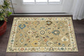 3' X 5' Beige Dark Orange And Blue Oriental Area Rug With Fringe