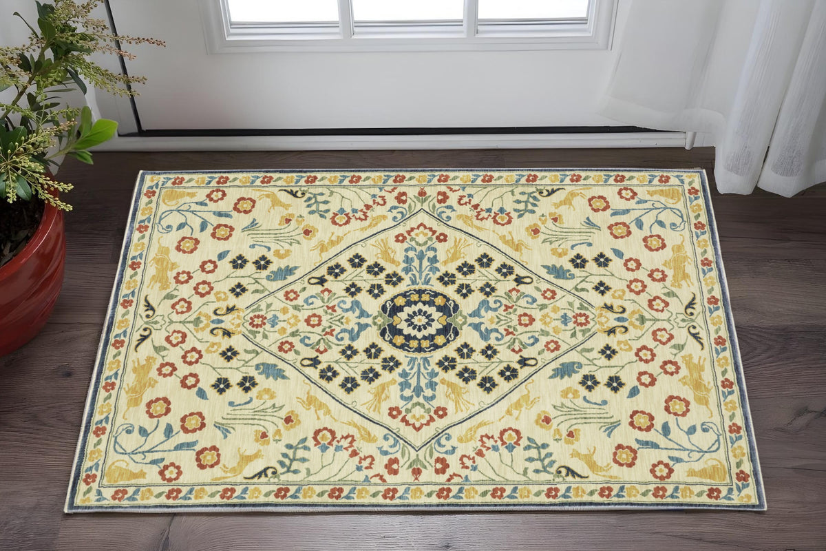 3' X 5' Ivory Blue And Burnt Orange Oriental Area Rug With Fringe
