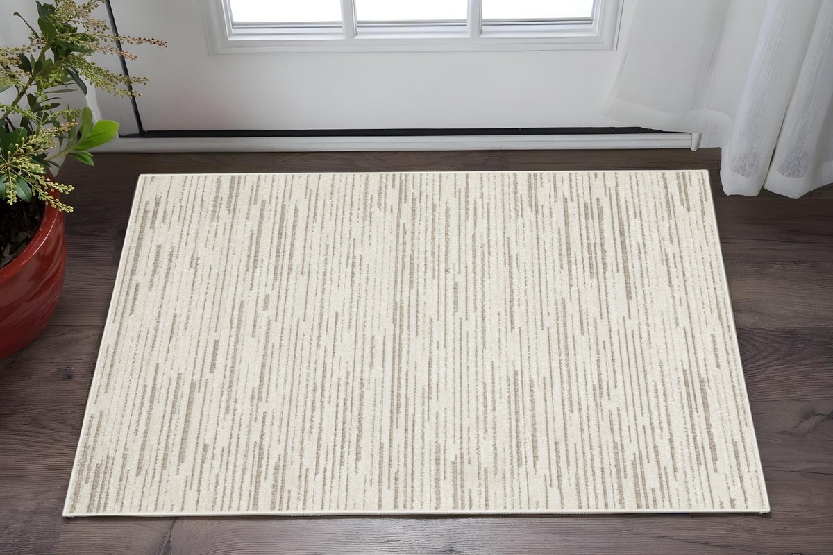 3' X 5' Ivory And Brown Striped Distressed Area Rug