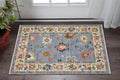 3' X 5' Blue Yellow And Ivory Oriental Area Rug With Fringe
