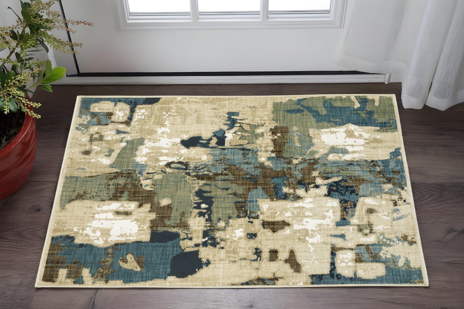 3' X 5' Beige Blue And Brown Abstract Area Rug