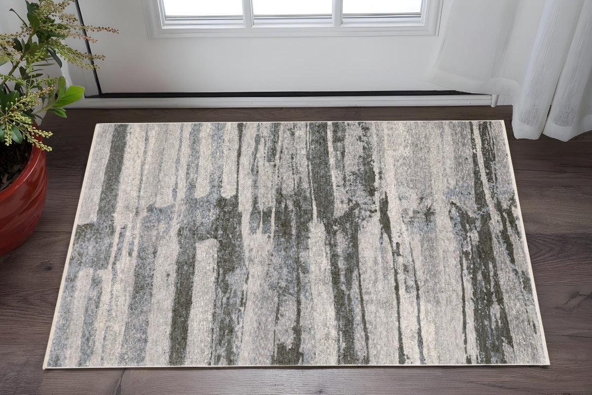 3' X 5' Gray And Ivory Abstract Area Rug With Fringe