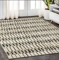 5' X 8' Beige And Black Geometric Area Rug