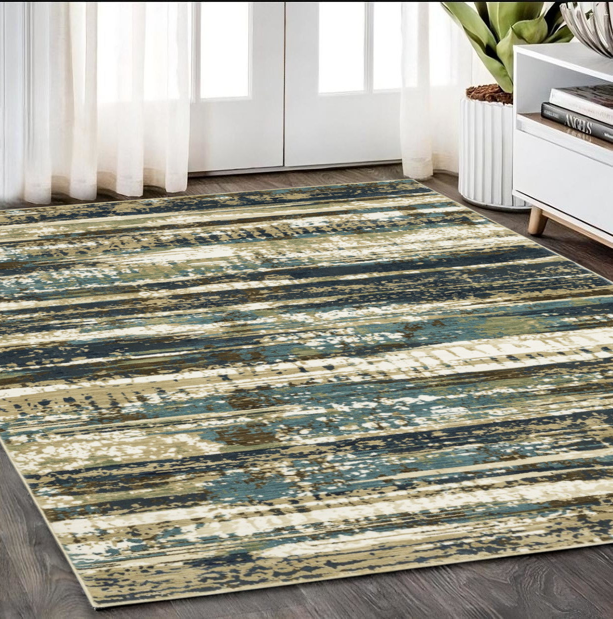 5' X 8' Beige And Blue Abstract Area Rug