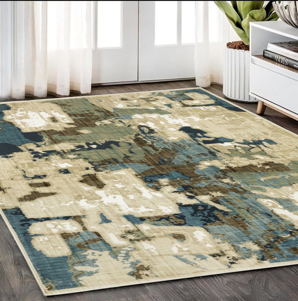 5' X 8' Beige Blue And Brown Abstract Area Rug