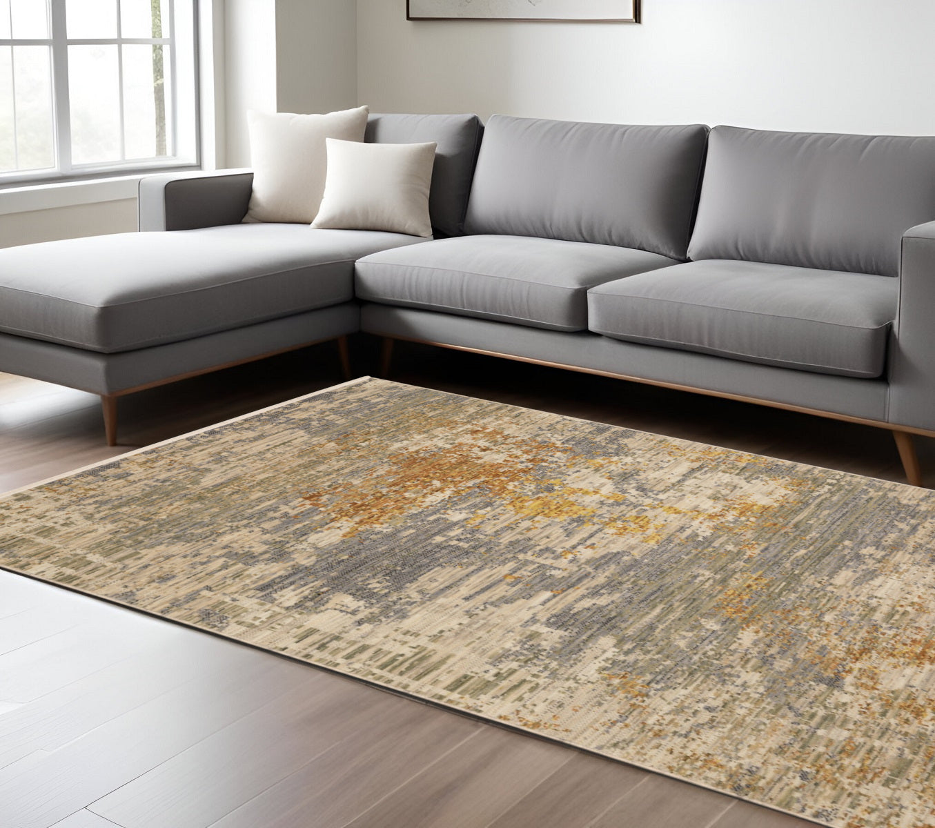 7' X 10' Beige And Gold Abstract Area Rug With Fringe