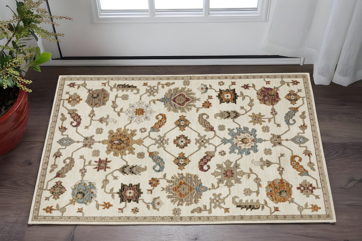 3' X 5' Ivory Gray And Orange Oriental Area Rug