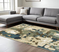 8' X 11' Beige Brown And Blue Abstract Area Rug
