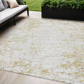 5' X 8' Gold And Ivory Abstract Washable Indoor Outdoor Area Rug