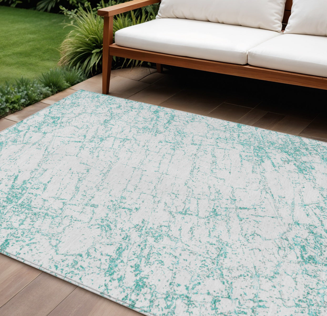 9' X 12' Teal Blue And Ivory Abstract Washable Indoor Outdoor Area Rug