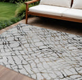 10' X 14' Silver Gray And Charcoal Abstract Washable Indoor Outdoor Area Rug