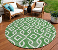 8' Emerald And Ivory Round Geometric Washable Indoor Outdoor Area Rug