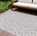 10' X 14' Lavender And Ivory Geometric Washable Indoor Outdoor Area Rug