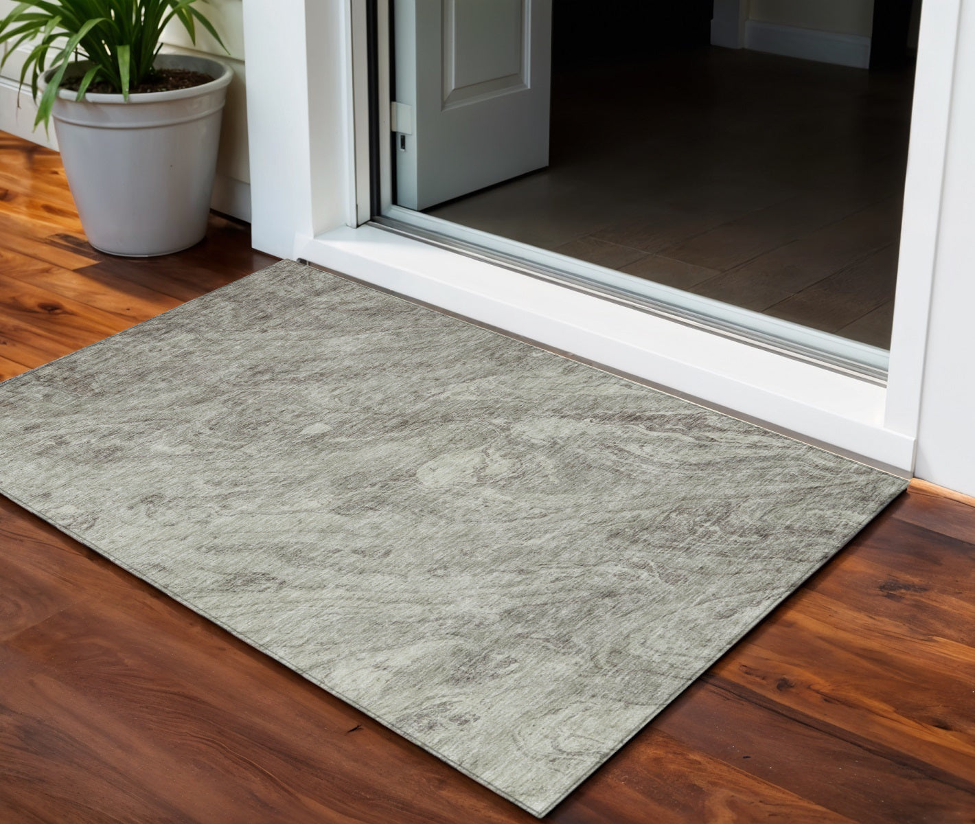 3' X 5' Taupe Beige And Tan Abstract Washable Indoor Outdoor Area Rug