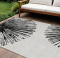 10' X 14' Black And Ivory Abstract Washable Indoor Outdoor Area Rug