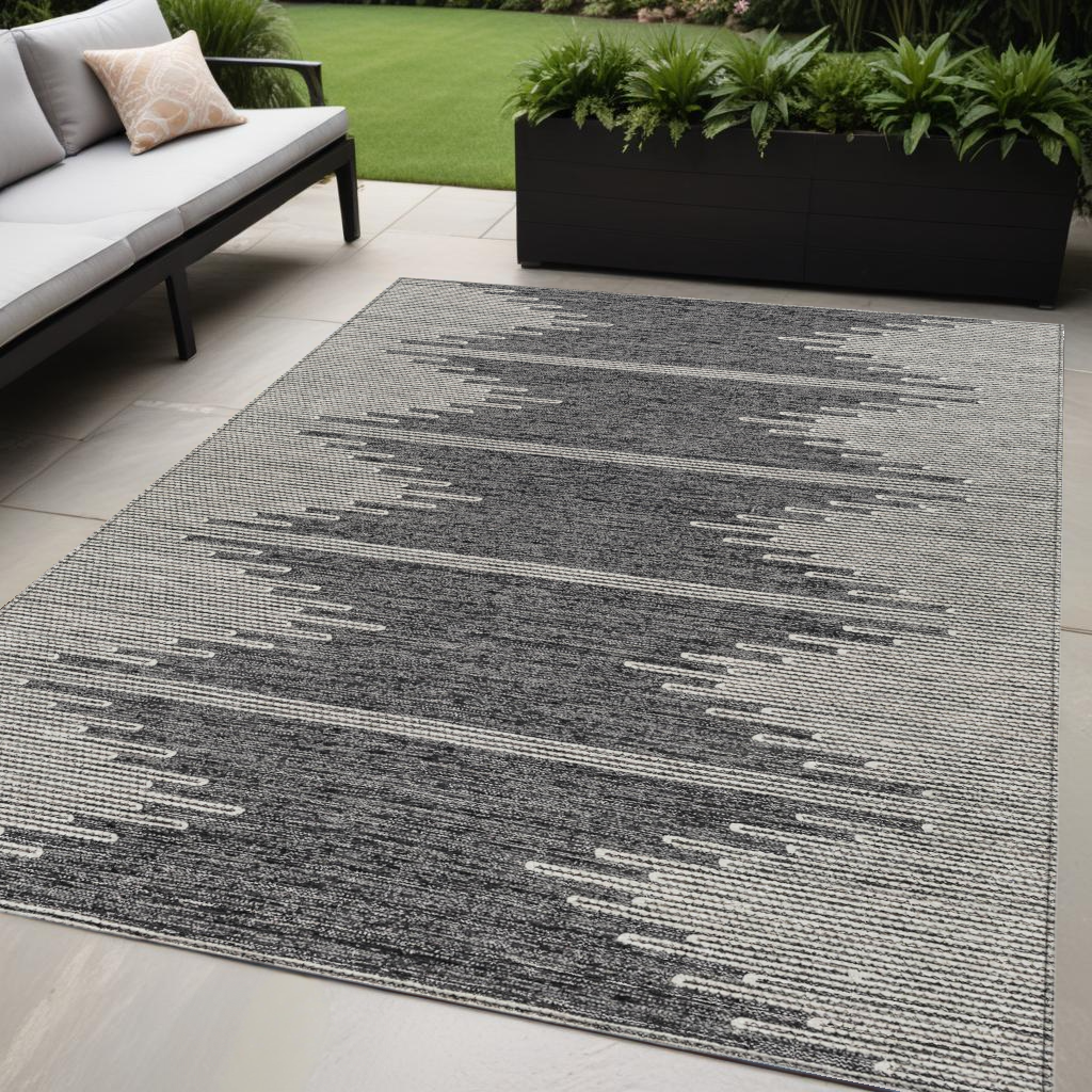 5' X 8' Charcoal And Ivory Abstract Washable Indoor Outdoor Area Rug