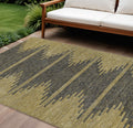 9' X 12' Dark Gray And Gold Abstract Washable Indoor Outdoor Area Rug