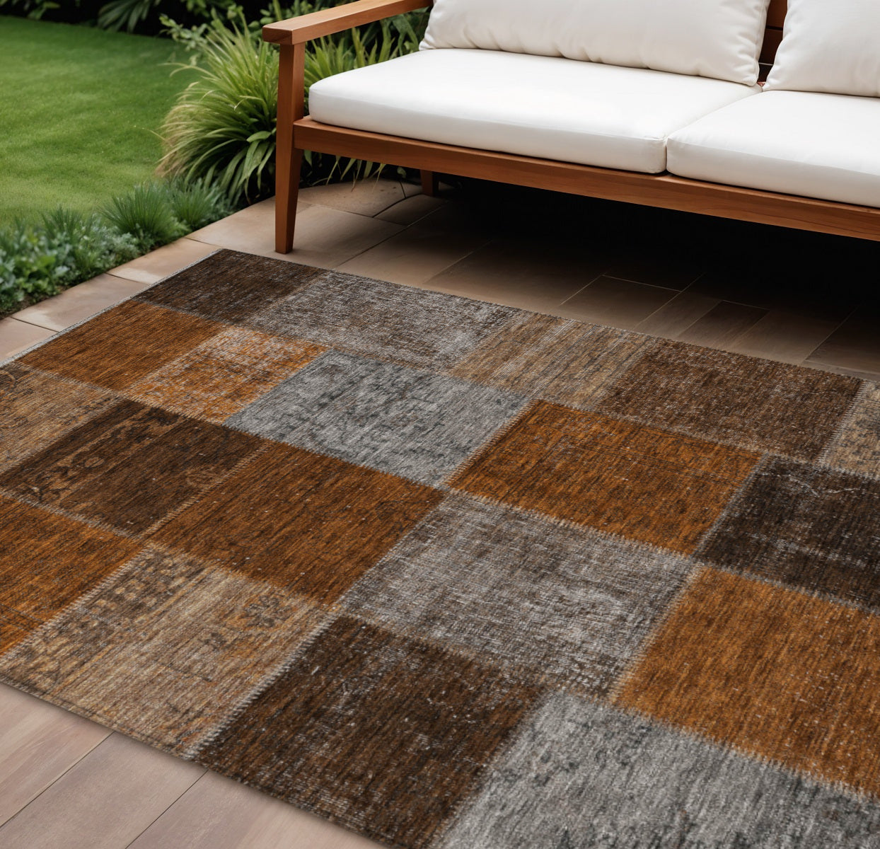 9' X 12' Orange And Taupe Patchwork Washable Indoor Outdoor Area Rug