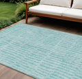 9' X 12' Teal Blue And Aqua Striped Washable Indoor Outdoor Area Rug