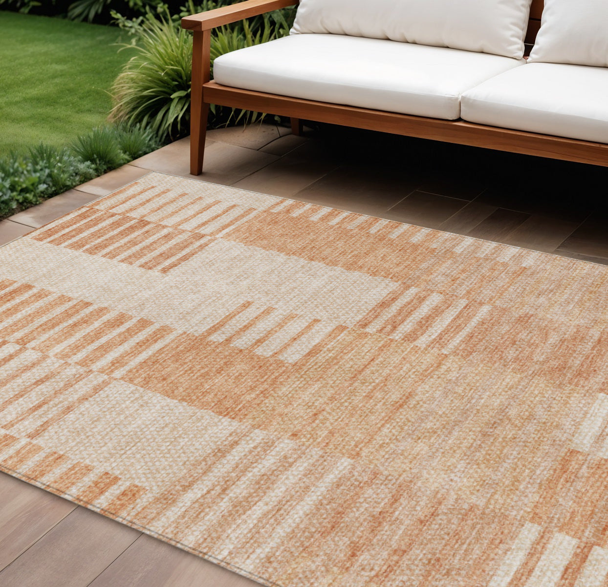 9' X 12' Salmon Peach And Ivory Striped Washable Indoor Outdoor Area Rug