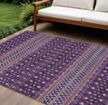 10' X 14' Purple Pink And Yellow Tribal Washable Indoor Outdoor Area Rug