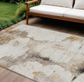 8' X 10' Beige Ivory And Taupe Abstract Washable Indoor Outdoor Area Rug