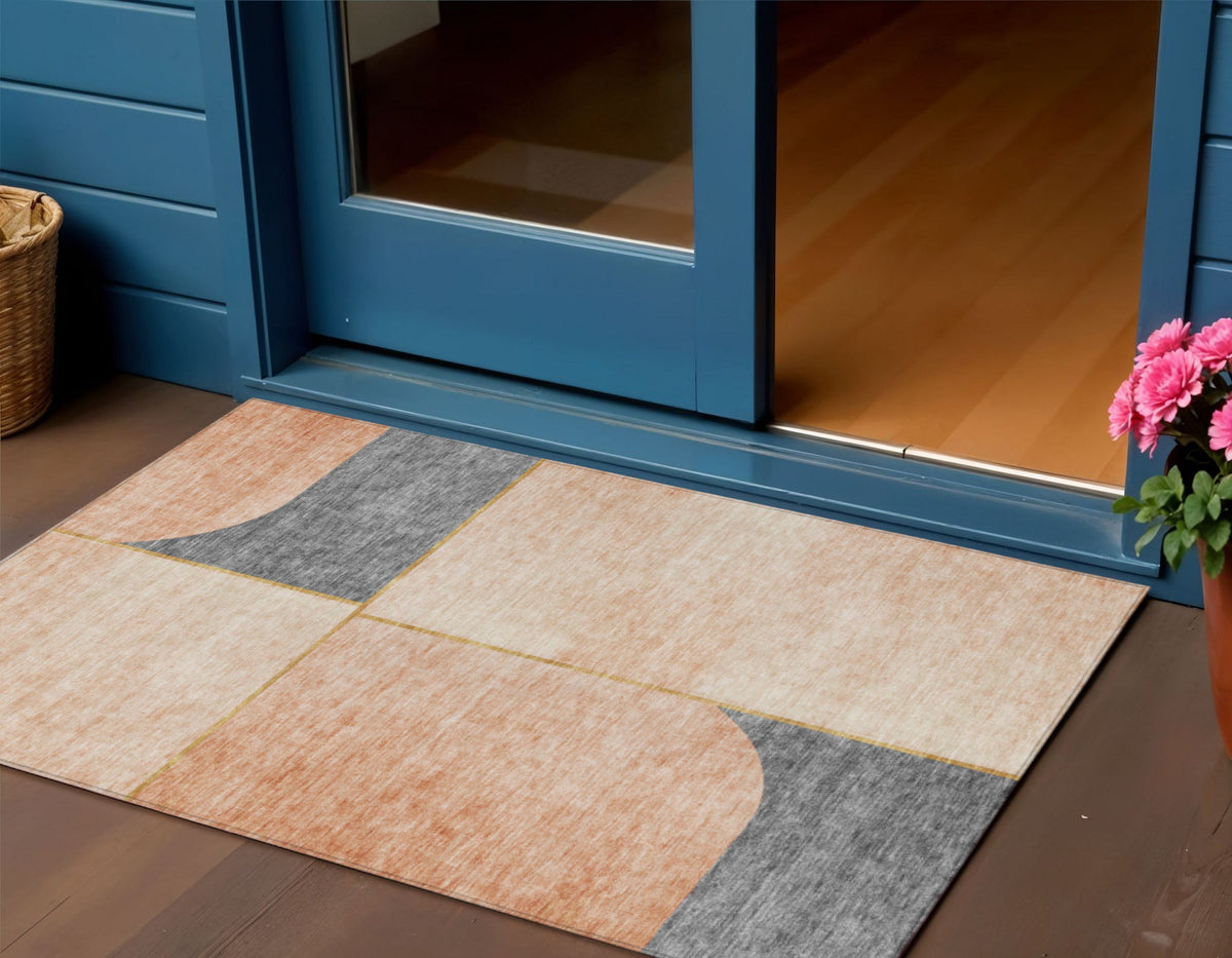 3' X 5' Coral Peach And Gray Abstract Washable Indoor Outdoor Area Rug