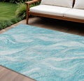 10' X 14' Teal Blue Aqua And Ivory Abstract Washable Indoor Outdoor Area Rug